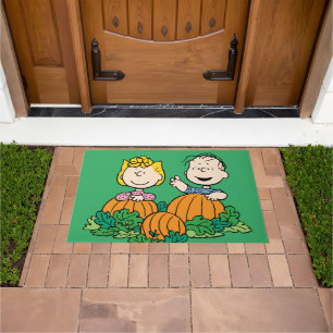 Erdnüsse   Sally & Linus auf dem Pumpkin-Feld Fußmatte