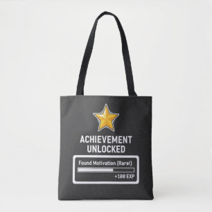 Erfolg freigeschaltet Motivation gefunden im Gamer Tasche