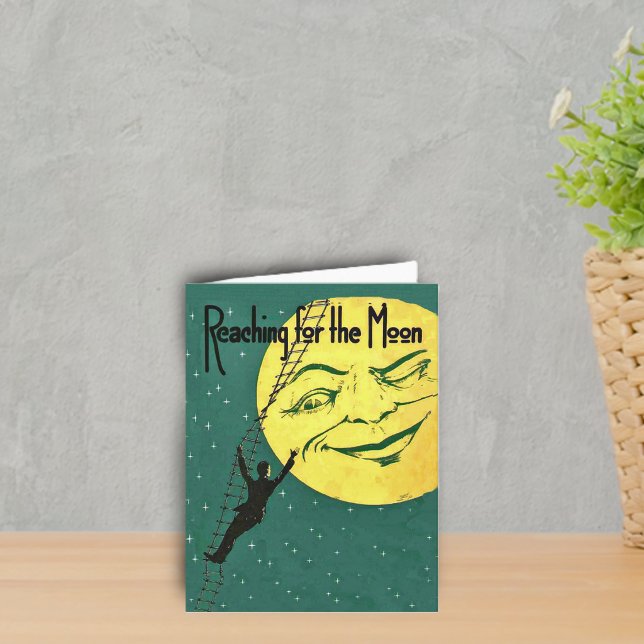 Erhalten der Mondmerkarte Karte (Man climbing ladder to reach yellow winking moon with face on emerald green with stars notecard.)