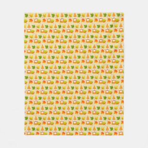 Erntedank-Zwerg und Herbstlaub auf Beige Fleecedecke