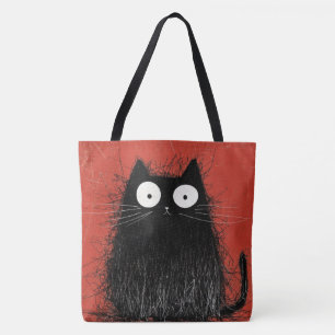 Erschrockenes schwarzes Katzen auf lebhaftem Karme Tasche