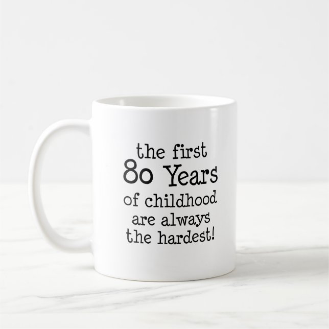 Erste 80 Jahre der Kindheits-lustigen Tasse (Links)