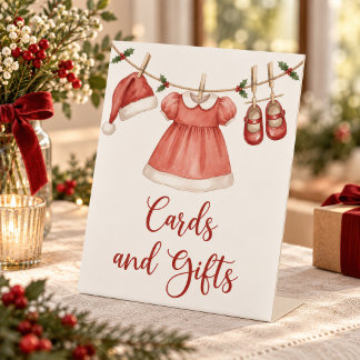 Erste Weihnachtskarten und Geschenke fürs Baby Sockelschild