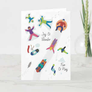 Erster Schnee Winter Kinder spielen Schneeengel Feiertagskarte