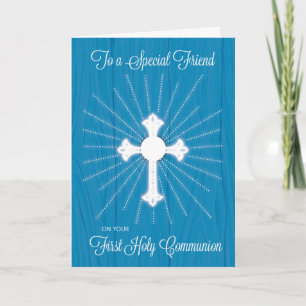 Erstkommunionkreuz und Strahlen auf blauem Holz fü Karte