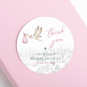 Es braucht eine Village Stork Winter Girl Babydusc Runder Aufkleber