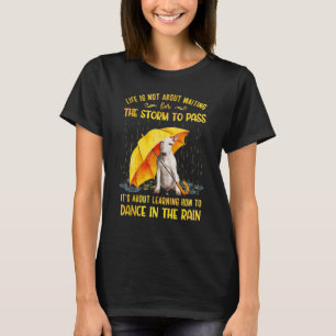 Es geht darum zu lernen, wie man im Regen Bull tan T-Shirt