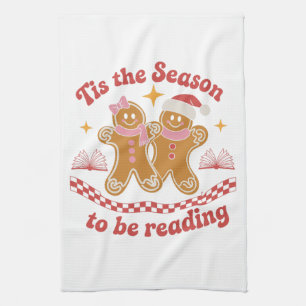 Es ist die Zeit zum Lesen von Weihnachtsbüchern in Geschirrtuch