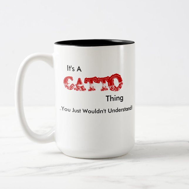 Es ist ein Catto-Ding... Zweifarbige Tasse (Links)