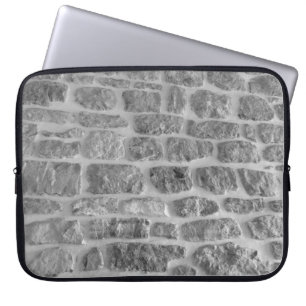 Es ist ein grobes, horizontal gezogenes Mauermuste Laptopschutzhülle