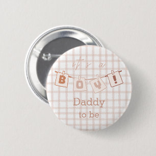 Es ist ein Junge! Süßes Gingham Notedry werdender Button
