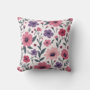 Es ist ein Kissen gemischt mit rosa Blume und lila