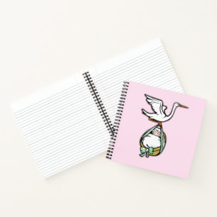Es ist ein Mädchen, das der Storch auf rosa Lizenz Notizbuch