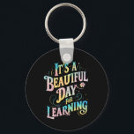 Es ist ein schöner Tag, um zurück zur Schule zu le Schlüsselanhänger<br><div class="desc">Es ist ein schöner Tag,  um zurück zur Schule zu lernen</div>