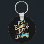 Es ist ein schöner Tag, um zurück zur Schule zu le Schlüsselanhänger<br><div class="desc">Es ist ein schöner Tag,  um zurück zur Schule zu lernen</div>