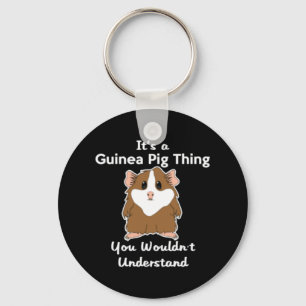 Es ist eine Guinea, die dich schwingt Schlüsselanhänger