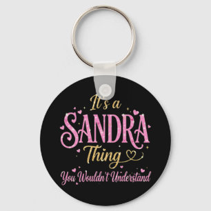 Es ist eine Sandra-Sache Rosa Gold Frauen Geschenk Schlüsselanhänger