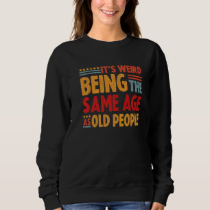 Es ist merkwürdig, das gleiche Alter wie alte Mens Sweatshirt