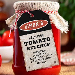 Essbarer hausgemachter Tomatenketchup mit rostigem Geschenkanhänger