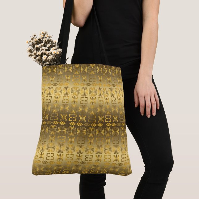 Ethnisches afrikanisches goldenes Muster mit Tasche (Von Nahem)
