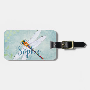 Étiquette À Bagage Dragonfly vintage sur un Arrière - plan floral déf