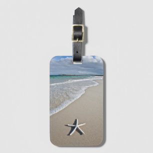 Étiquette À Bagage Étoiles de mer sur une plage à distance