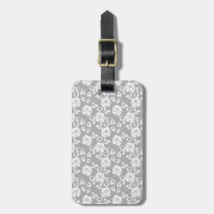 Étiquette À Bagage motif en dentelle blanche sur arrière - plan gris