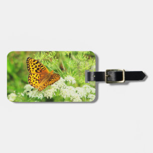 Étiquette À Bagage Papillon orange et noir avec les fleurs blanches