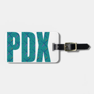 Étiquette À Bagage PDX marque avec des lettres le tapis d'aéroport de