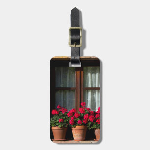 Étiquette À Bagage Pots de fleurs de fenêtre dans le village