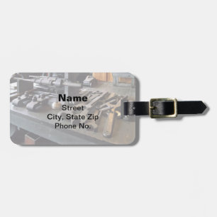 Étiquette À Bagage Poussettes et huile dans la machine Shop