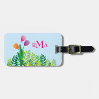 Tulipes colorées, végétation verte et monogramme