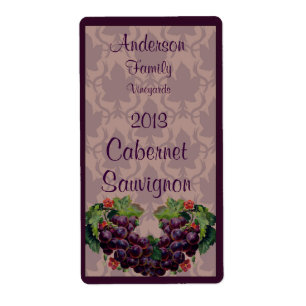 Étiquette à bouteille de vin rouge avec raisins