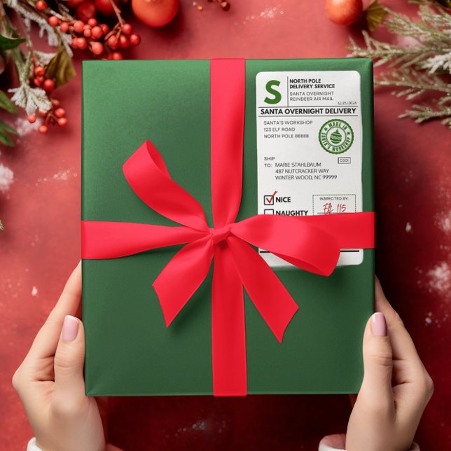 Étiquette d'expédition réaliste du Père Noël (Realistic Looking Santa Shipping Label on Present)