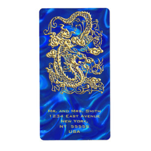 Étiquette Dragon d'or embouti sur papier satin bleu