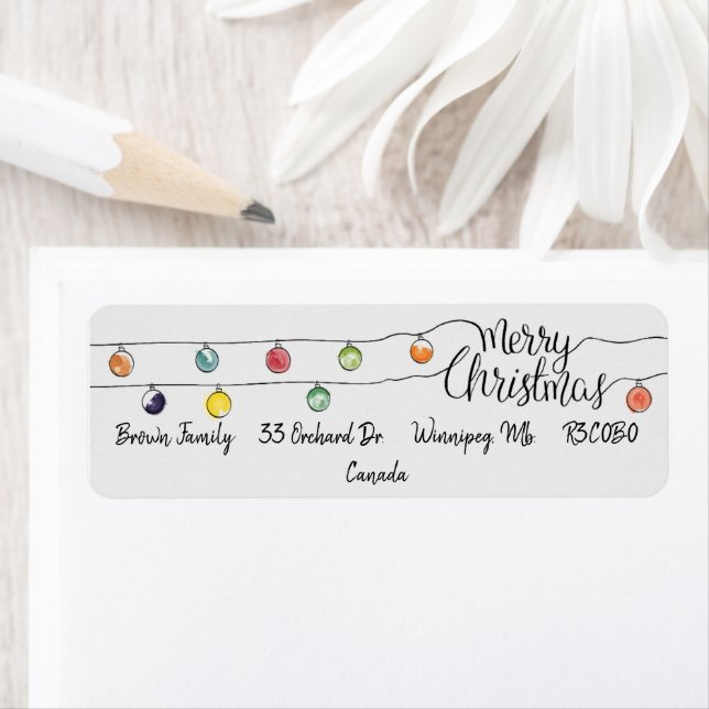 Étiquette Joyeuse chaîne de Noël des lumières (En situation)