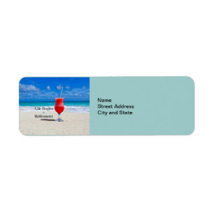 Étiquette Life Begins at Retirement, frosty drink on beach