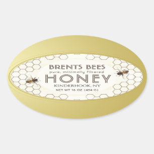 Étiquette miel ovale avec abeille, nid d'abeille,