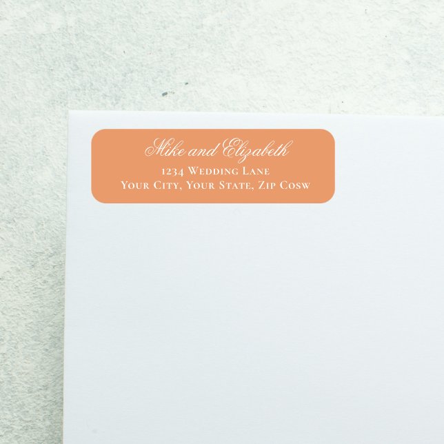 Étiquette Peach Wedding Monogram Floral Script (Peach calligraphy return address label with couple names, elegant wedding envelope styling)