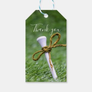 Étiquettes-cadeau Golf avec ruban sur herbe verte merci
