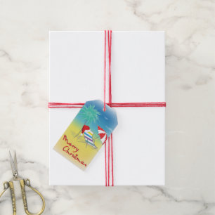 Étiquettes-cadeau Joyeux Noël Santa Hat Whimsical Beach Scène