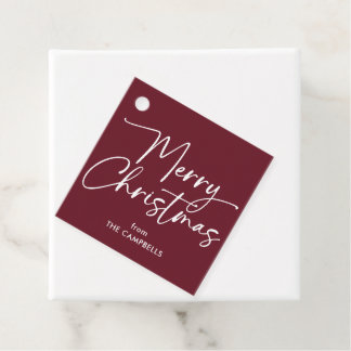 Étiquettes Cadeau Joyeux Noël sur fond rouge Bourgogne