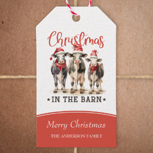 Étiquettes-cadeau Noël dans les vaches rustiques de la grange à Sant
