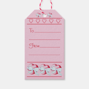 Étiquettes-cadeau ruban blanc romantique enroulé autour du coeur rou