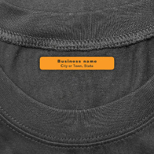 Étiquettes Marque d'affaires sur un rectangle orange en fer s
