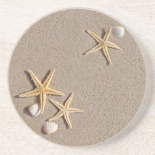 Étoiles de mer sur les dessous de verre de plage