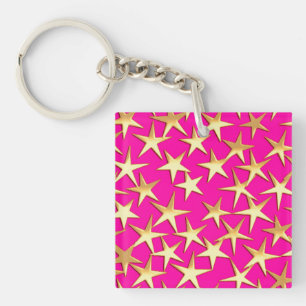Étoiles dorées sur fond rose fuchsia