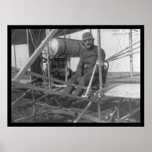 Eugene Lefebvre sitzt 1909 in seinem Flugzeug Poster