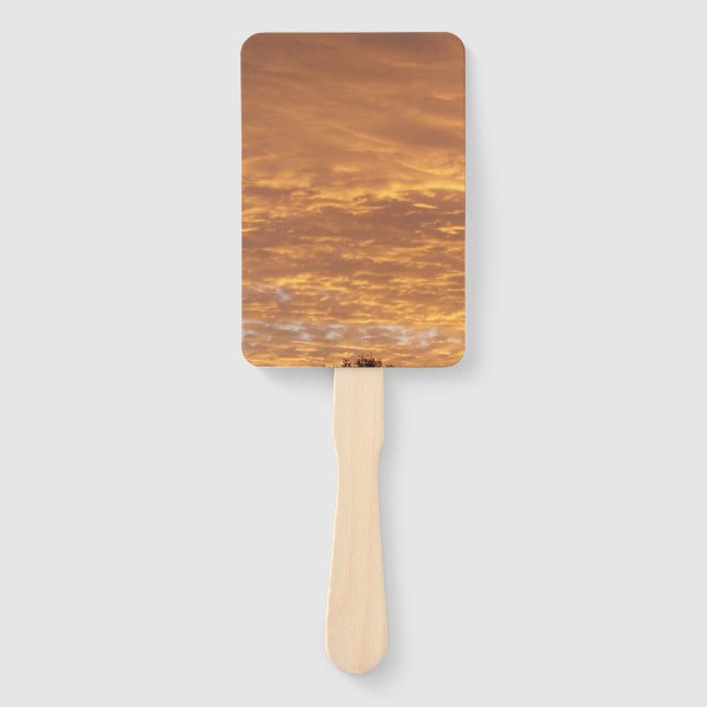 Éventail lever de soleil doré sur un ventilateur à main (Devant)