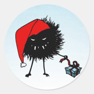 Evil Christmas Bug Opening Present Runder Aufkleber